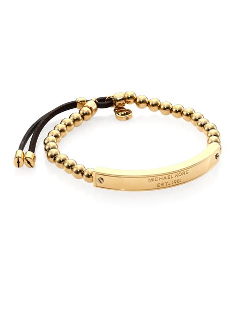 michael kors heritage armband|Michael Kors charm bracelet.